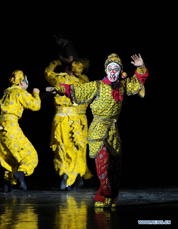 Artists perform during the opening ceremony of the "Tourism Year of China" in Moscow, March 22, 2013. The "China-Russia Tourism Year" program, which began last year with the "Tourism Year of Russia" in China, aims to foster tourism ties and humanistic exchanges between the two countries. (Xinhua/Jiang Kehong)