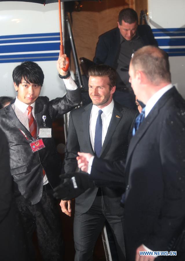 Football superstar David Beckham receives warm welcome as he arrives in Wuhan, capital of central China's Hubei Province, as the ambassador for the Chinese Super League (CSL) and the Youth Football Program, March 22, 2013. (Xinhua)