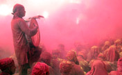 Indian people celebrate Latthmaar Holi festival