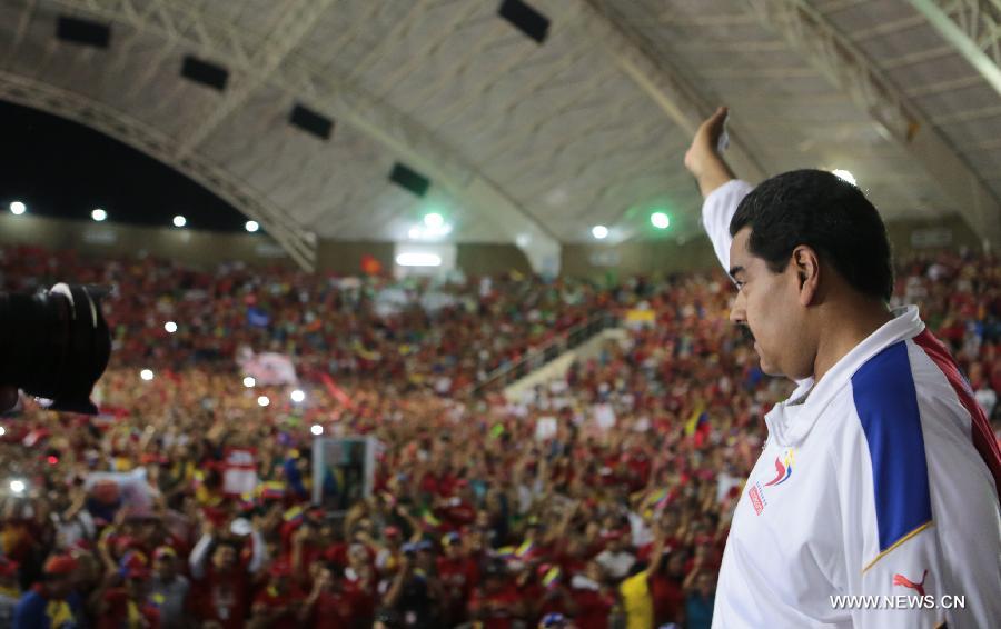 mage provided by Command Campaign Hugo Chavez shows Venezuela's Acting President Nicolas Maduro attending a rally in Lara State, Venezuela, on March 24, 2013. (Xinhua/Command Campaign Hugo Chavez)