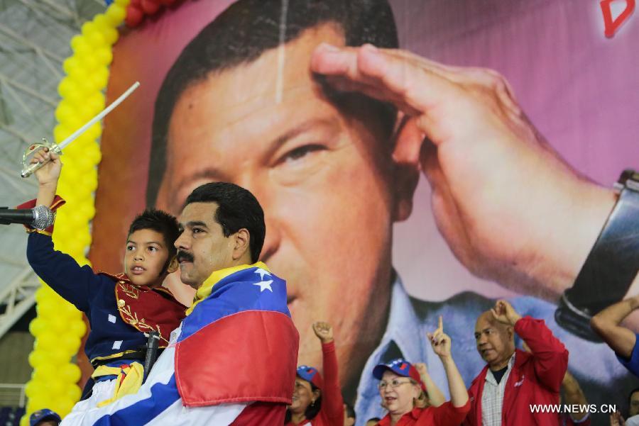 Image provided by Command Campaign Hugo Chavez shows Venezuela's Acting President Nicolas Maduro attending a rally in Lara State, Venezuela, on March 24, 2013. (Xinhua/Command Campaign Hugo Chavez)