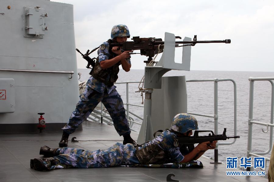 The 14th escort taskforce under the Navy of the Chinese People's Liberation Army (PLA) expels several suspected vessels. (Xinhua/Rao Rao)