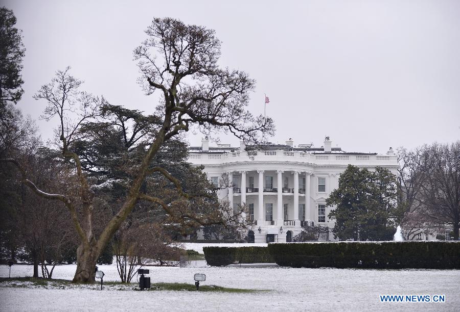 Photo taken on March 25, 2013 shows a view of the snow-covered South Lawn of the White House in Washington D.C., capital of the United States. (Xinhua/Zhang Jun)