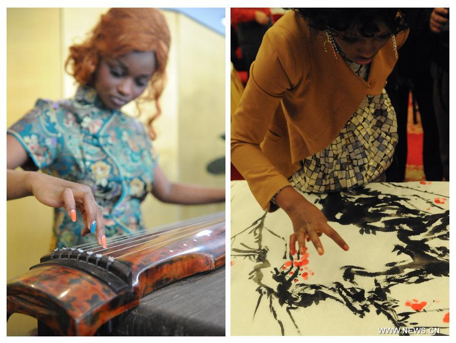 The combined photo shows Aida Yang plays Guqin, a seven-stringed plucked instrument (left, taken on March 7, 2013) and she creates a Chinese painting (right, taken on Jan. 24, 2013) in her studio in Beijing, capital of China. (Xinhua/Zhang Ruiqi) 