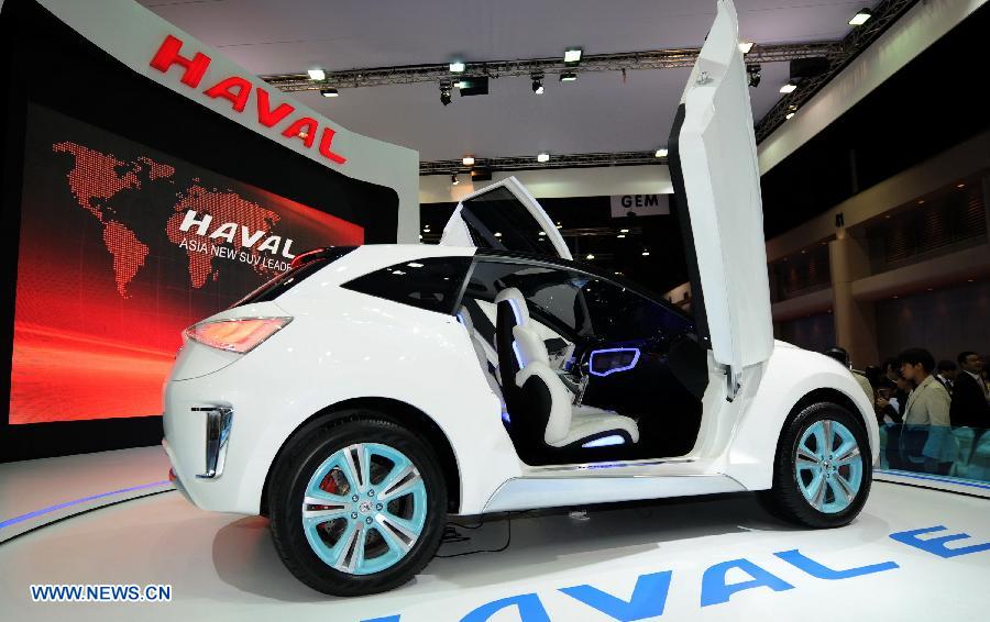 Photo taken on March 26, 2013 shows an SUV car of Great Wall Motor being displayed during the press preview of the 34th Bangkok International Motor Show in Bangkok, Thailand. The 34th Bangkok International Motor Show will be held from March 27 to April 7. (Xinhua/Gao Jianjun)  