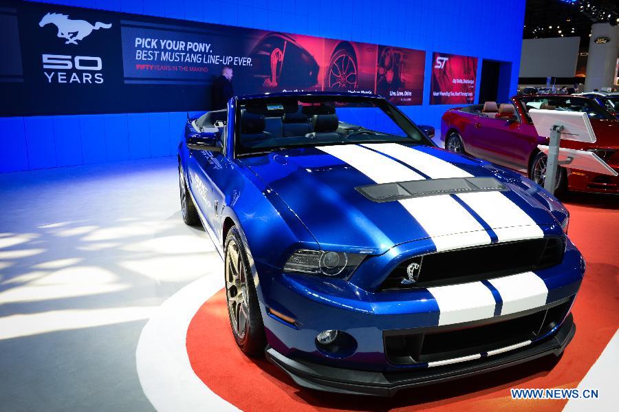 A Ford Mustang Shelby GT500 convertible is on display during press preview of the 2013 New York International Auto Show in New York, on March 27, 2013. The show features about 1,000 vehicles and will open to the public from March 29 to April 7. (Xinhua/Niu Xiaolei)  