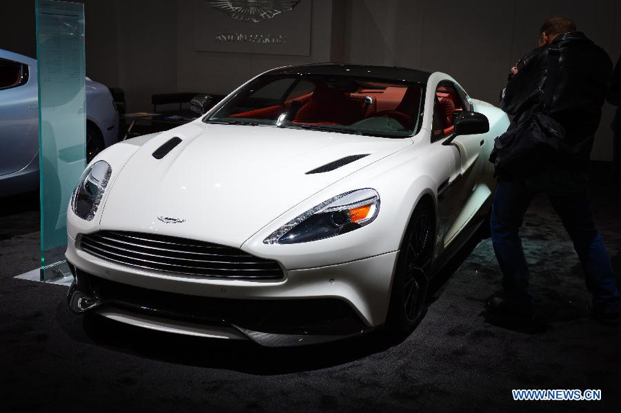 An Aston Martin sports car is on display during press preview of the 2013 New York International Auto Show in New York, on March 27, 2013. The show features about 1,000 vehicles and will open to the public from March 29 to April 7. (Xinhua/Niu Xiaolei) 