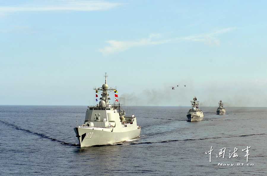 The combat-readiness cruise and high-sea training taskforce under the South China Sea Fleet of the Navy of the Chinese People's Liberation Army (PLA) arrived at the waters off the Zengmuansha Reef of the Nansha Islands and held a grand oath-taking ceremony on March 26, 2013.(chinamil.com.cn/Qian Xiaohu and Song Xin)