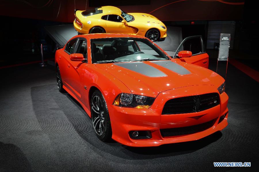 A Chrysler Charger SRT Super Bee sedan is on display during press preview of the 2013 New York International Auto Show in New York, on March 27, 2013. The show features about 1,000 vehicles and will open to the public from March 29 to April 7. (Xinhua/Niu Xiaolei) 