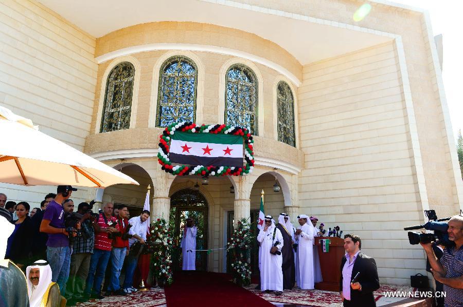 Photo taken on March 27, 2013 shows the scene of the inauguration ceremony of Syrian embassy in Doha, Qatar. Syrian embassy in Doha was handed over to the exiled Syrian opposition on Wednesday, one day after Arab leaders rushed through a declaration granting Damascus' seat at the Arab League to the Syrian opposition. (Xinhua/Qin Haishi) 