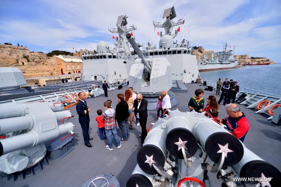 Local Maltese and tourists visit the Chinese frigate "Hengyang" at the grand habour of Valletta, Malta, on March 27, 2013. An Open Day of the "Hengyang" for Maltese was held on Wednesday. The 13th naval escort squad, sent by the Chinese People's Liberation Army (PLA) Navy, arrived at Valletta of Malta on Tuesday for a five-day visit after finishing its escort missions. (xinhua/Xu Nizhi)