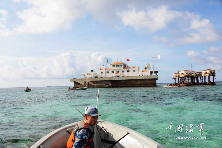 A joint maneuver taskforce under the South Sea Fleet of the Navy of the Chinese People’s Liberation Army (PLA) patrols the Meiji Reef, a fishing area and shelter for Chinese fishermen on March 27, 2013. (navy.81.cn/Qian Xiaohu, Song Xin) 