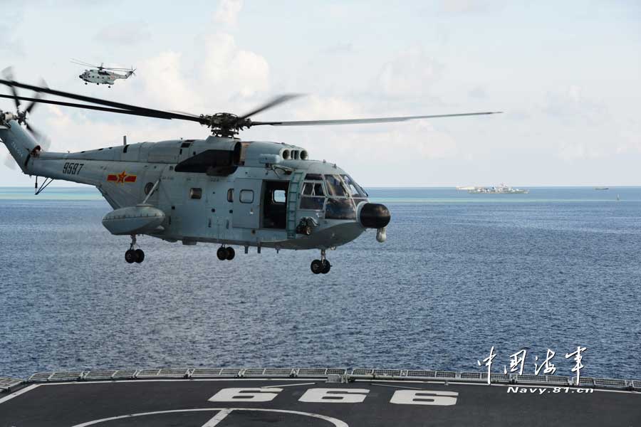 A joint maneuver taskforce under the South Sea Fleet of the Navy of the Chinese People’s Liberation Army (PLA) patrols the Meiji Reef, a fishing area and shelter for Chinese fishermen on March 27, 2013. (navy.81.cn/Qian Xiaohu, Song Xin) 