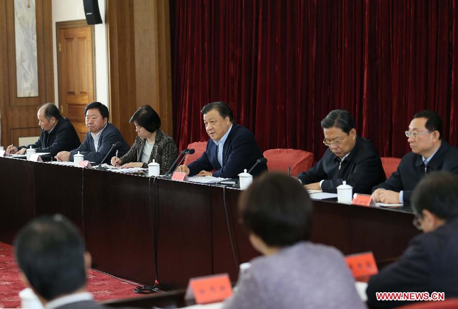 Liu Yunshan (back, 3rd R), a member of the Standing Committee of the Political Bureau of the Communist Party of China (CPC) Central Committee and president of the CPC's top Party school, presides over a symposium on carrying on sound style of study in Beijing, capital of China, March 28, 2013. (Xinhua/Liu Weibing) 