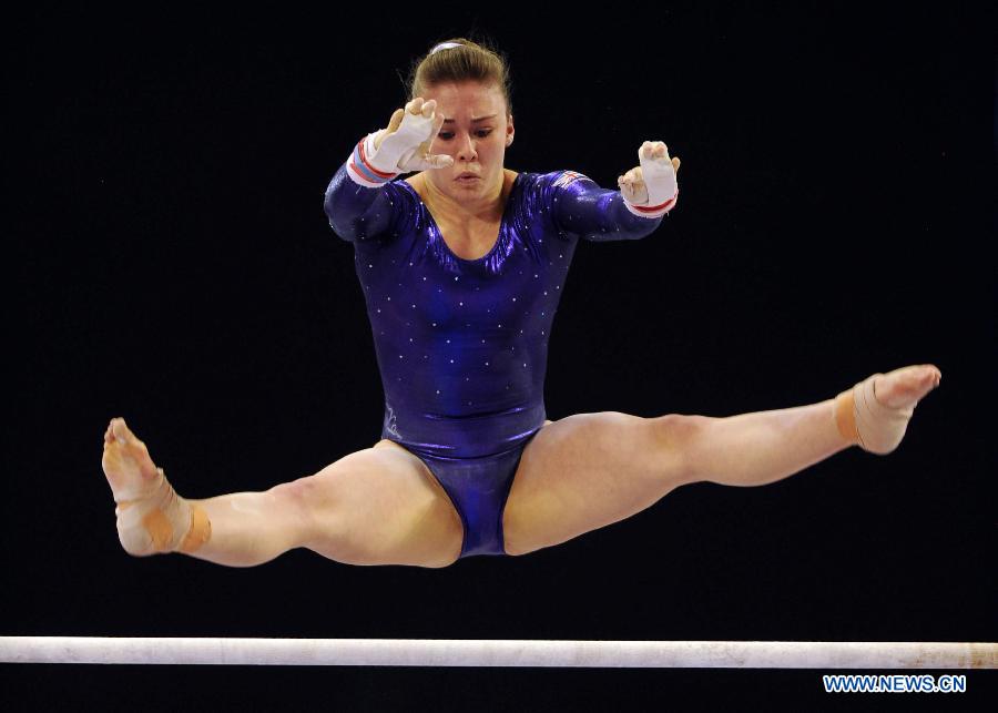 Ruby Harrold of Britain performs during the uneven bars final at the 6th FIG Artistic Gymnastics world Challenge Cup in Doha, Qatar, March 28, 2013. Harrold took the silver medal with 14.500 points. (Xinhua/Chen Shaojin) 