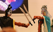 Robots perform Peking Opera at metal exhibition