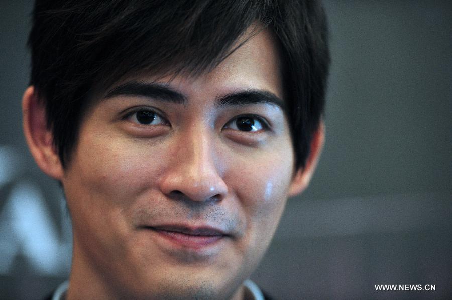 Actor Vic Chou attends the press conference for the movie "Saving General Yang" in Singapore's Sentosa, March 30, 2013. (Xinhua/Then Chih Wey)