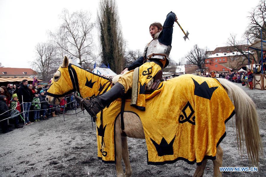 An equestrian performs as the medieval knight during the annual Knight Festival, which opened in the Spandau Zitadelle (Citadel) in Berlin, March 30, 2013. A wide range of activities presenting the life and scene dating back to the European medieval times at the 3-day Knight Festival attracts many Berliners on outing during their Easter vacation. (Xinhua/Pan Xu)