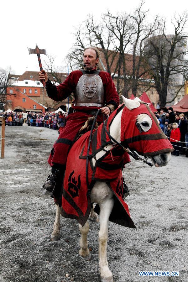 An equestrian performs as the medieval knight, during the annual Knight Festival, which opened in the Spandau Zitadelle (Citadel in Berlin, March 30, 2013. A wide range of activities presenting the life and scene dating back to the European medieval times at the 3-da Knight Festival attracts many Berliners on outing during their Easter vacation. (Xinhua/Pan Xu)