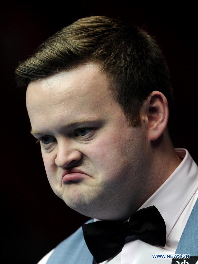 Shaun Murphy of England reacts during the semifinal match against compatriot Mark Selby at the 2013 World Snooker China Open in Beijing, China, March 30, 2013. Murphy lost the match 2-6. (Xinhua/Gong Lei)