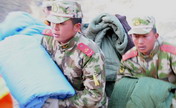 Body found after Tibet landslide buries 83