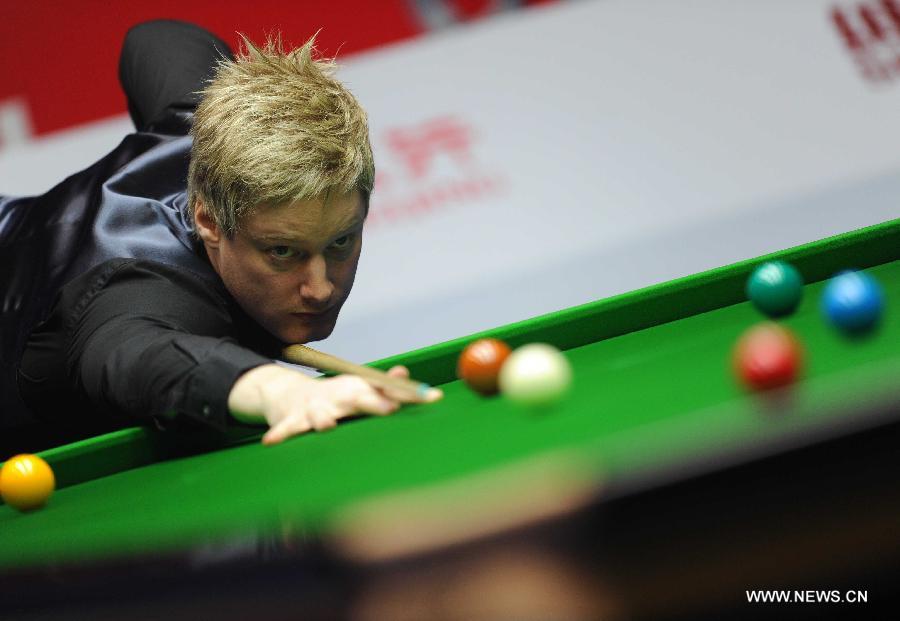 Neil Robertson of Australia competes during his final match against Mark Selby of England at the 2013 World Snooker China Open in Beijing, China, March 31, 2013. Robertson won 10-6 to claim the title. (Xinhua/Gong Lei)