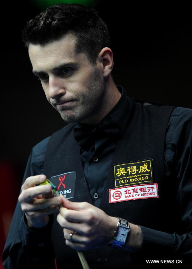 Mark Selby of England competes during his final match against Neil Robertson of Australia at the 2013 World Snooker China Open in Beijing, China, March 31, 2013. Robertson won 10-6 to claim the title. (Xinhua/Gong Lei)