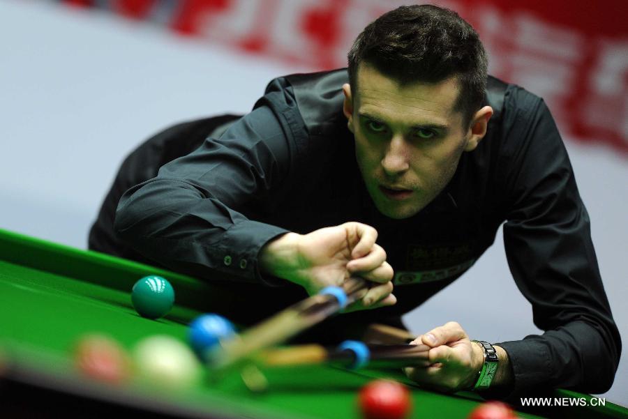 Mark Selby of England competes during his final match against Neil Robertson of Australia at the 2013 World Snooker China Open in Beijing, China, March 31, 2013. Robertson won 10-6 to claim the title. (Xinhua/Gong Lei)