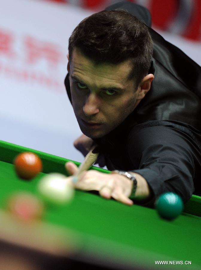 Mark Selby of England competes during his final match against Neil Robertson of Australia at the 2013 World Snooker China Open in Beijing, China, March 31, 2013. Robertson won 10-6 to claim the title. (Xinhua/Gong Lei)