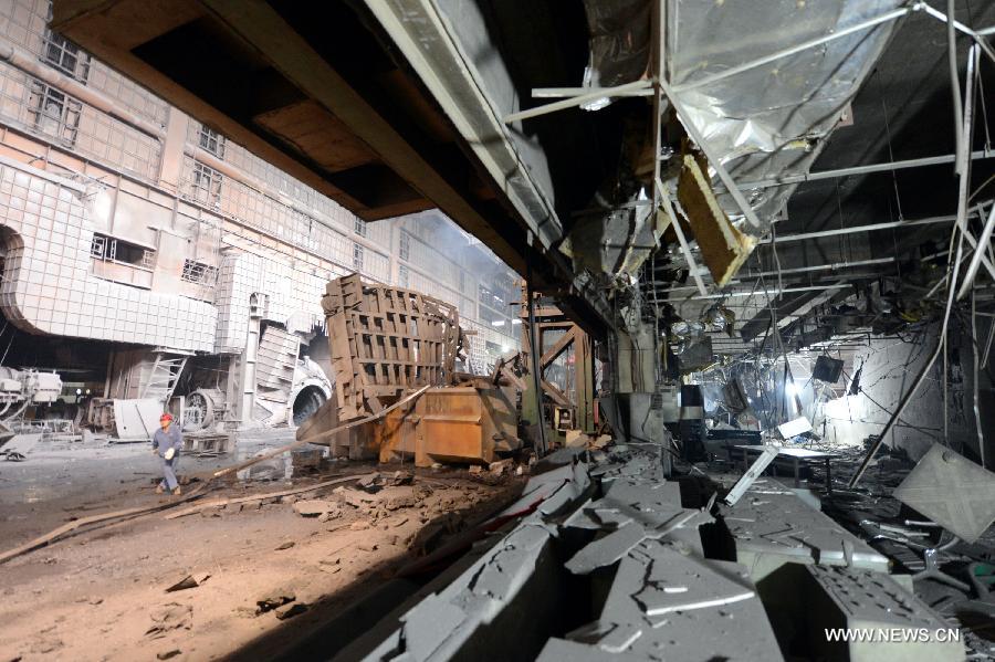 Debris is seen at the site of a furnace explosion at the Xinyu Iron and Steel Group Company in Xinyu City, east China's Jiangxi Province, April 1, 2013. A furnace exploded at 11:22 a.m. at the company on Monday, which killed four people and injured another 32. The injured have been hospitalized. (Xinhua/Song Zhenping)