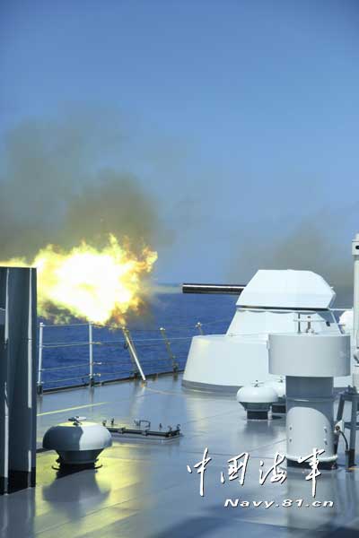 A warship of a joint maneuver taskforce under the South Sea Fleet of the Chinese People's Liberation Army (PLA) Navy conducts a live-ammunition fire drill in the west Pacific Ocean on March 31, 2013. (navy.81.cn/Qian Xiaohu, Song Xin, Gan Jun and Gao Yi)