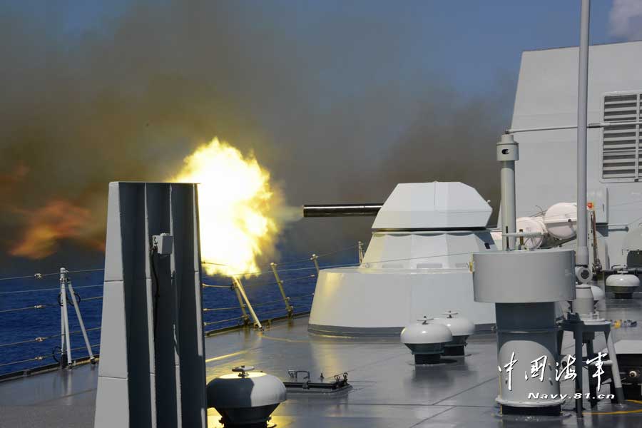 A warship of a joint maneuver taskforce under the South Sea Fleet of the Chinese People's Liberation Army (PLA) Navy conducts a live-ammunition fire drill in the west Pacific Ocean on March 31, 2013. (navy.81.cn/Qian Xiaohu, Song Xin, Gan Jun and Gao Yi)