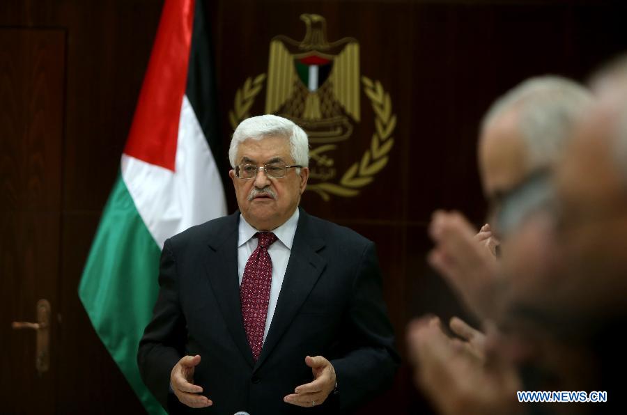 Palestinian President Mahmoud Abbas speaks during a meeting of Fatah Movement central committee at the Presidential headquarters in the West Bank city of Ramallah on April 2, 2013. Abbas blamed the government of Israeli Prime Minister Benjamin Netanyahu on Tuesday for the death of a prisoner suffering from terminal cancer. (Xinhua/Fadi Arouri) 