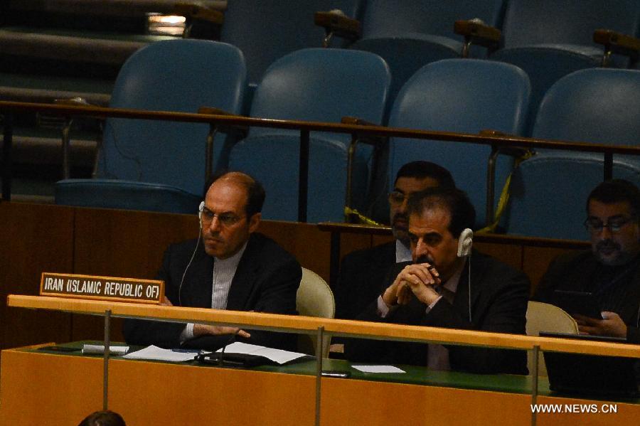 Delegates of Iran attend a meeting on the Arms Trade Treaty at the UN headquarters in New York, April 2, 2013. The UN General Assembly on Tuesday voted to adopt the Arms Trade Treaty, which regulates the multi-billion-U.S. dollar international arms trade. The treaty was adopted by a vote of 154 to 3, with 23 countries abstaining from the vote. The Democratic People's Republic of Korea (DPRK), Iran and Syria voted against the treaty. (Xinhua/Niu Xiaolei) 