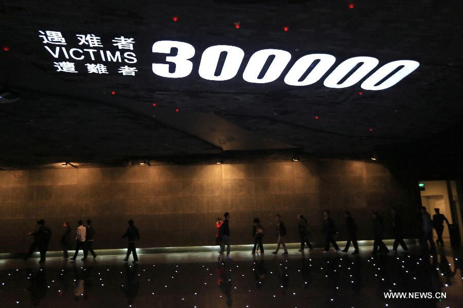 Tourists visit the Memorial Hall of the Victims in Nanjing Massacre by Japanese Invaders, in Nanjing, capital of east China's Jiansu Province, April 3, 2013. Lots of citizens came here to mourn Nanjing Massacre victims on the occassion of Qingming Festival, or Tomb-Sweeping Day, which falls on April 4 this year. (Xinhua/Han Hua)