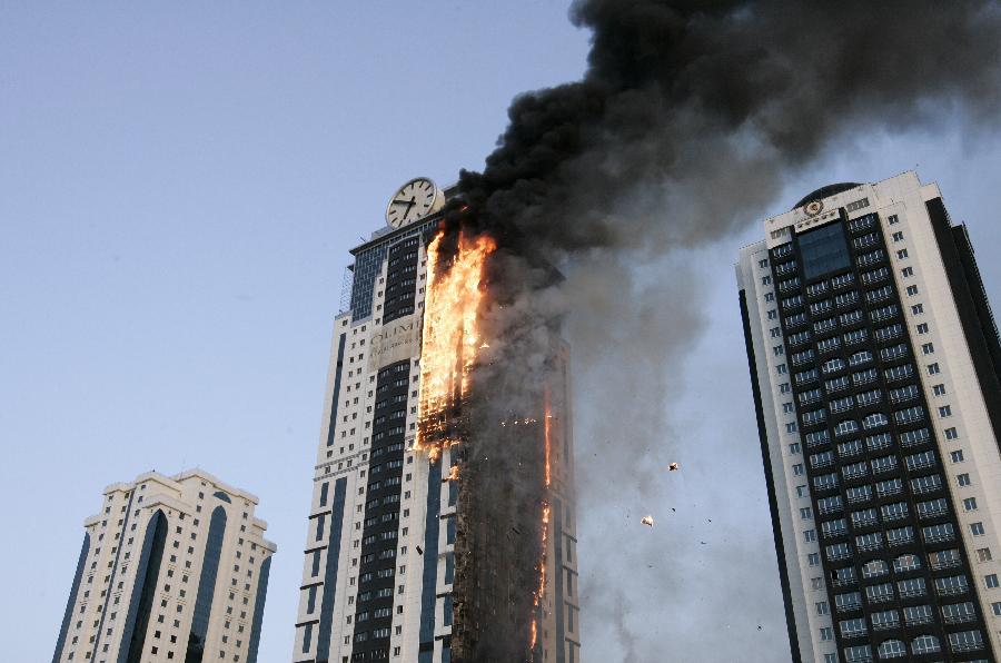 A fire rages in a 40-story skyscraper in Grozny, the capital of Russia's Chechnya, April 3, 2013. (Xinhua/RIA Novosti)