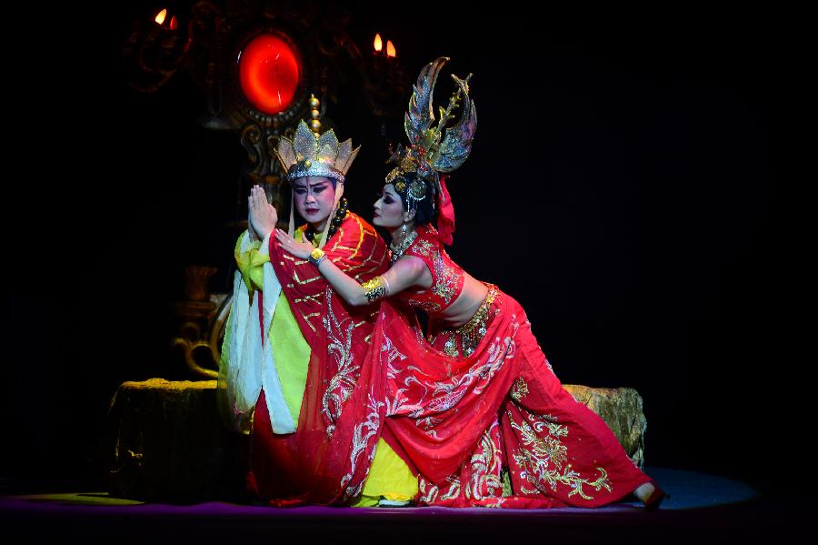 Members from the Guangzhou Acrobatics Troupe perform "Journey to the West" during the Fourth Lanzhou Art Festival in Lanzhou, capital of northwest China's Gansu Province, April 4, 2013. The performance retold the classic Chinese story of the same name. (Xinhua/Jia Xiaoyun)