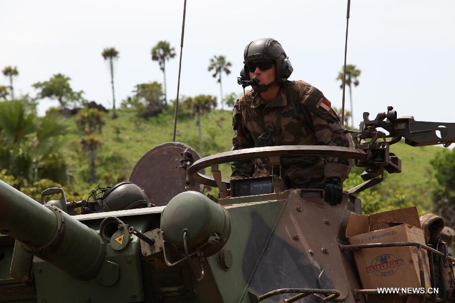 A French soldier takes part in a joint drill with Cote d'Ivoire soldiers ahead of the latters' departure for Mali, in Toumodi, 200 kilometers northwest of Abidjan, Cote d'Ivoire, April 6, 2013. (Xinhua/Koula Coulibaly) 