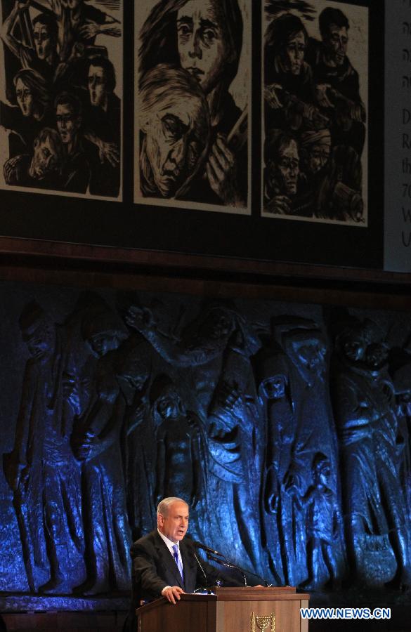 Israeli Prime Minister Benjamin Netanyahu speaks during the official ceremony for Israeli annual Holocaust Martyrs and Heroes Remembrance Day at the Yad Vashem Holocaust memorial in Jerusalem on April 7, 2013. (Xinhua/Jini) 