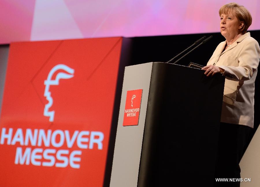German Chancellor Angela Merkel speaks during the opening ceremony of the Hanover industrial trade fair in Hanover, western Germany, on April 7, 2013. Russia is the partner country of the Hanover industrial trade fair 2013, which runs from April 8 to 12. (Xinhua/Ma Ning)