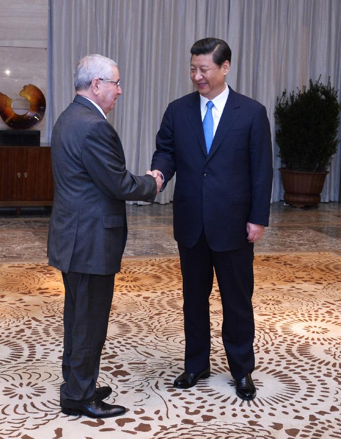 Chinese President Xi Jinping (R) shakes hands with President of Council of the Nation of Algeria Abdelkader Bensalah during their meeting on the sidelines of Boao Forum for Asia (BFA) Annual Conference 2013 in Boao, south China's Hainan Province, April 7, 2013. (Xinhua/Pang Xinglei) 