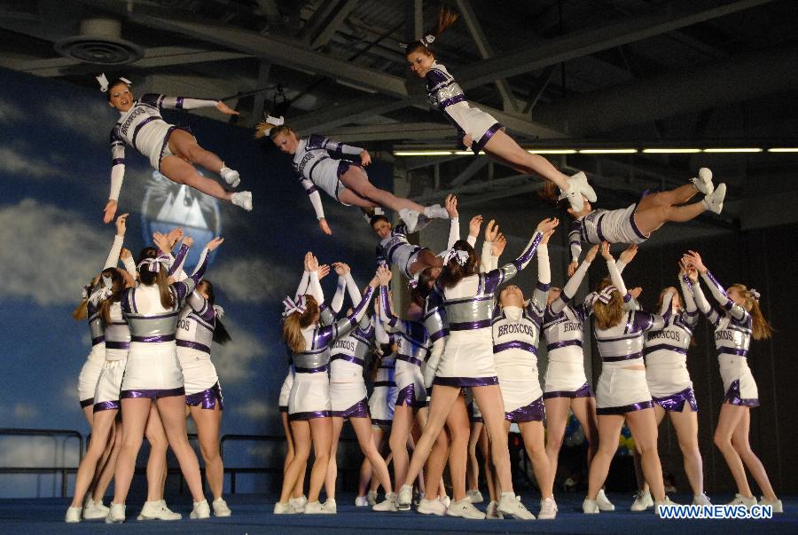 Cheerleaders compete during the 2013 Sea to Sky International Cheerleading Championship in Vancouver, Canada, on April 7, 2013. More than 3,500 athletes from 135 cheerleading teams competed for a chance to perform at the 2013 World Cheerleading Championship in Orlando, Florida, at the end of April 2013. (Xinhua/Sergei Bachlakov) 