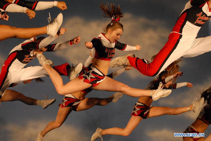 Cheerleaders compete during the 2013 Sea to Sky International Cheerleading Championship in Vancouver, Canada, on April 7, 2013. More than 3,500 athletes from 135 cheerleading teams competed for a chance to perform at the 2013 World Cheerleading Championship in Orlando, Florida, at the end of April 2013. (Xinhua/Sergei Bachlakov) 