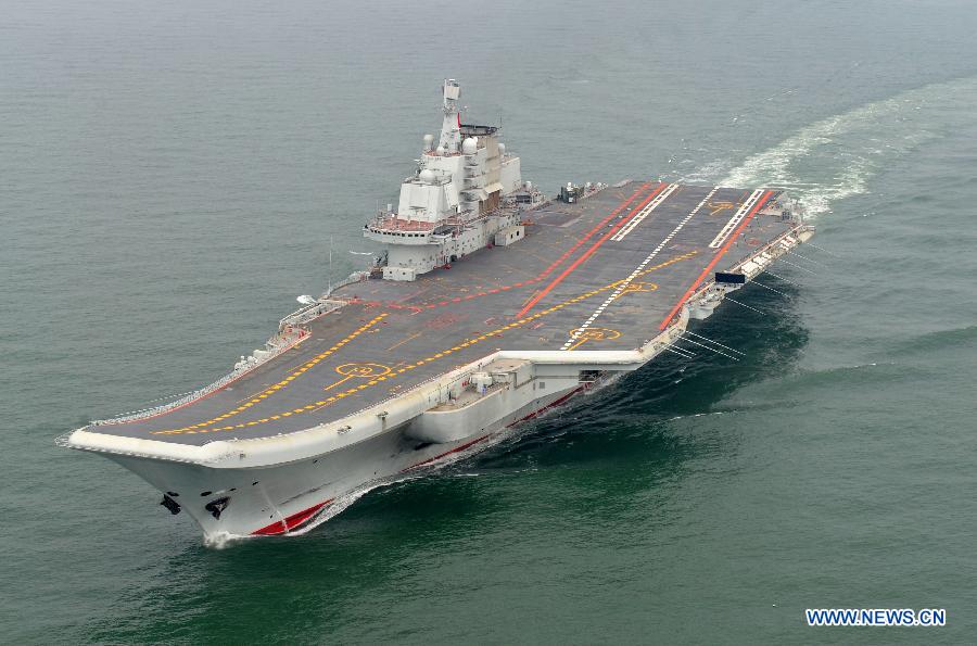 Photo taken in May 2012 shows a Chinese aircraft carrier cruising for a test on the sea. (Xinhua File Photo/Li Tang)