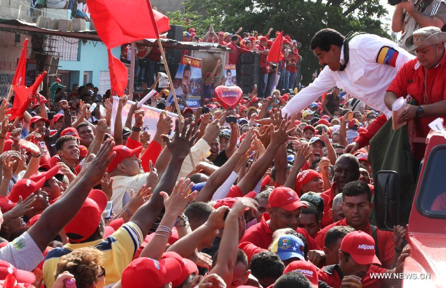 Image provided by Hugo Chavez Campaign Command shows Venezuelan Acting President and presidential candidate Nicolas Maduro (2nd R) attending a campaign in Sucre State, Venezuela, on April 8, 2013. Venezuela will held presidential elections on April 14. (Xinhua/Hugo Chavez Campaign Command) 