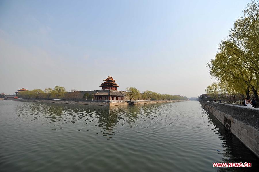 Green willows are seen near a watchtower of the Palace Museum, also known as the Forbidden City, in Beijing, capital of China, April 7, 2013. (Xinhua/Chen Yehua)