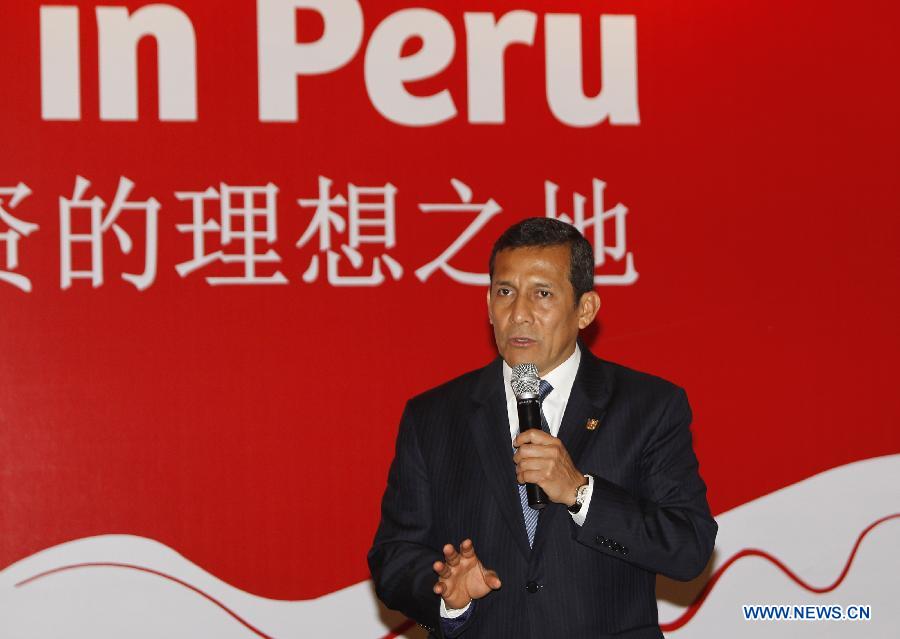 Peruvian President Ollanta Humala Tasso addresses a China-Peru trade and investment forum in Shanghai, east China, April 9, 2013. (Xinhua/Ren Long) 