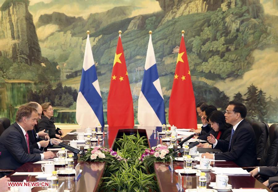 Chinese Premier Li Keqiang (1st R) meets with Finnish President Sauli Niinisto (1st L) during their meeting in Beijing, capital of China, April 9, 2013. (Xinhua/Ding Lin) 