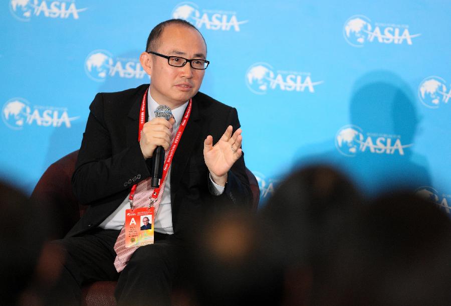 Pan Shiyi, Executive Chairman of real estate developer SOHO China Ltd., speaks during the session of "Curbing Property Market the Right Way?" at the Boao Forum for Asia (BFA) Annual Conference 2013 in Boao, south China's Hainan Province, April 8, 2013. (Xinhua/Xu Zijian)