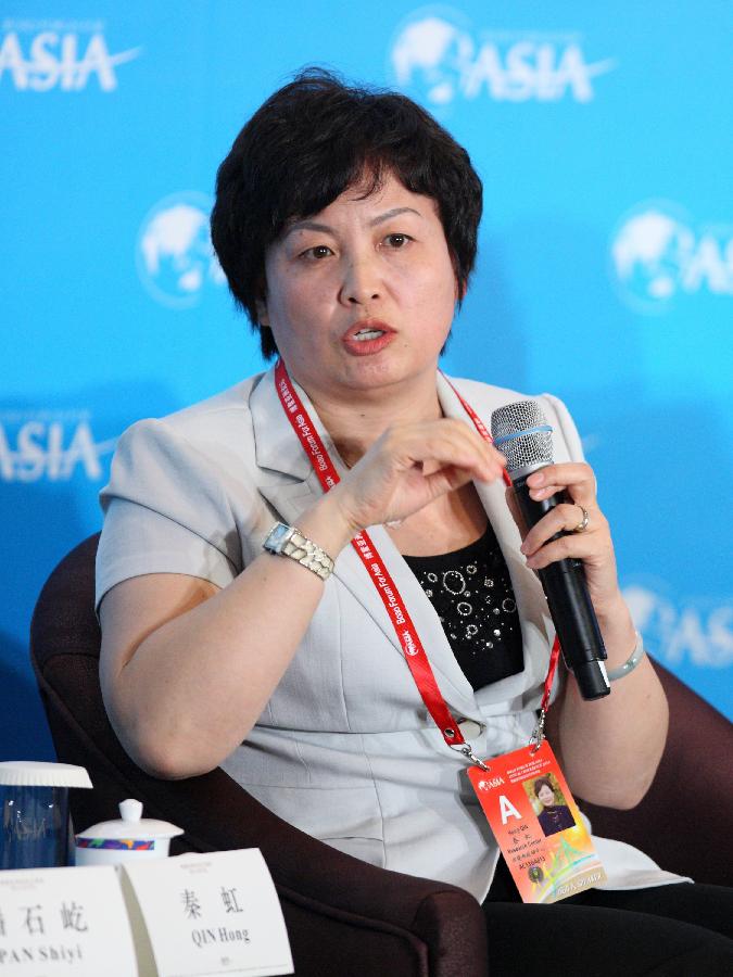 Qin Hong, Director of the Policy Research Center in the Chinese Ministry of Housing and Urban-Rural Development, speaks during the session of "Curbing Property Market the Right Way?" at the Boao Forum for Asia (BFA) Annual Conference 2013 in Boao, south China's Hainan Province, April 8, 2013. (Xinhua/Xu Zijian) 